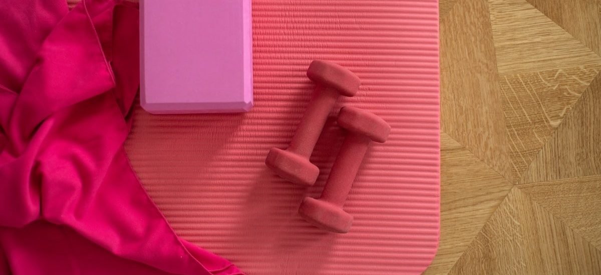 pink exercise mat with weights
