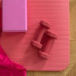 pink exercise mat with weights